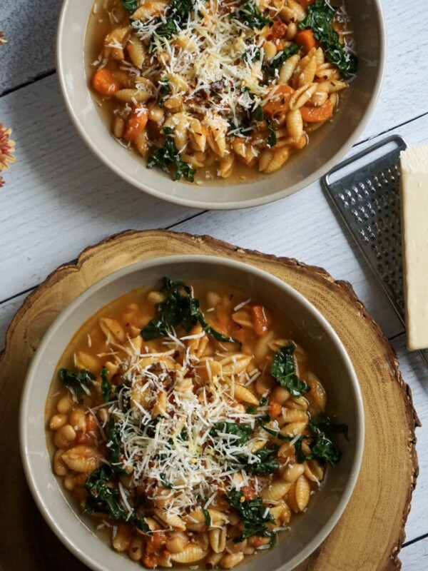 Italian soup with beans and kale in a ceramic soup bowl