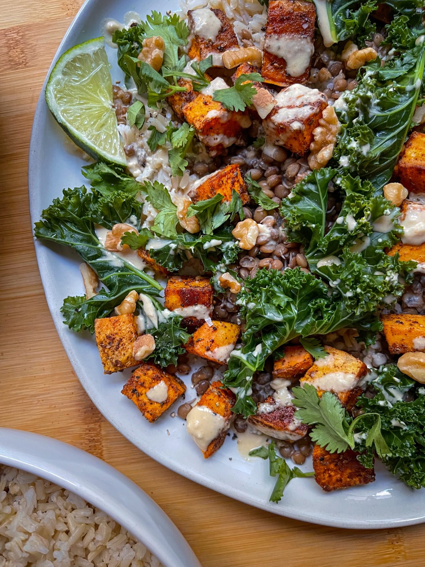 savory rice and lentils with roasted sweet potatoes and kale recipe nourish bowl