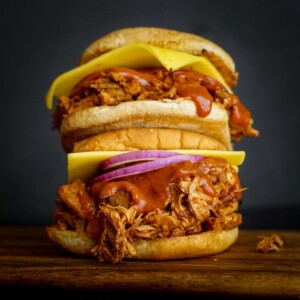 bbq sandwich on a wood cutting board