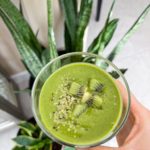 green smoothie made with bananas, zucchini, spinach and peanut butter all vegan