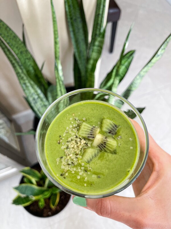 green smoothie made with bananas, zucchini, spinach and peanut butter all vegan