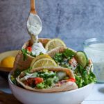 vegan chicken, romaine lettuce, pita bread and vegan tartar sauce