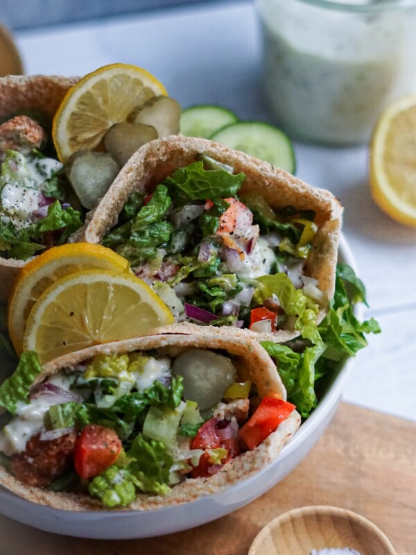 vegan chicken, salad, dairy free tartar sauce and pita bread