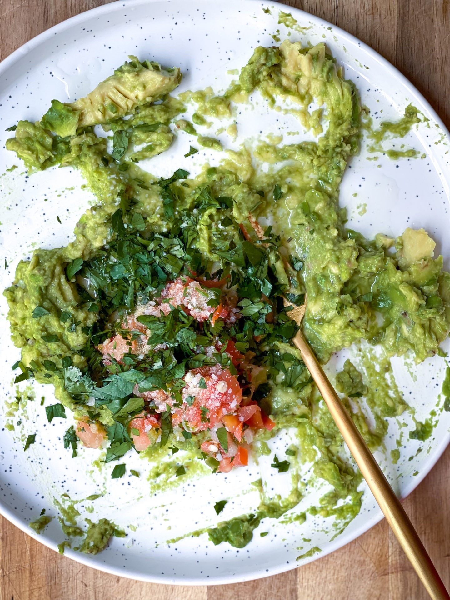 guacamole ingredients on a white plate