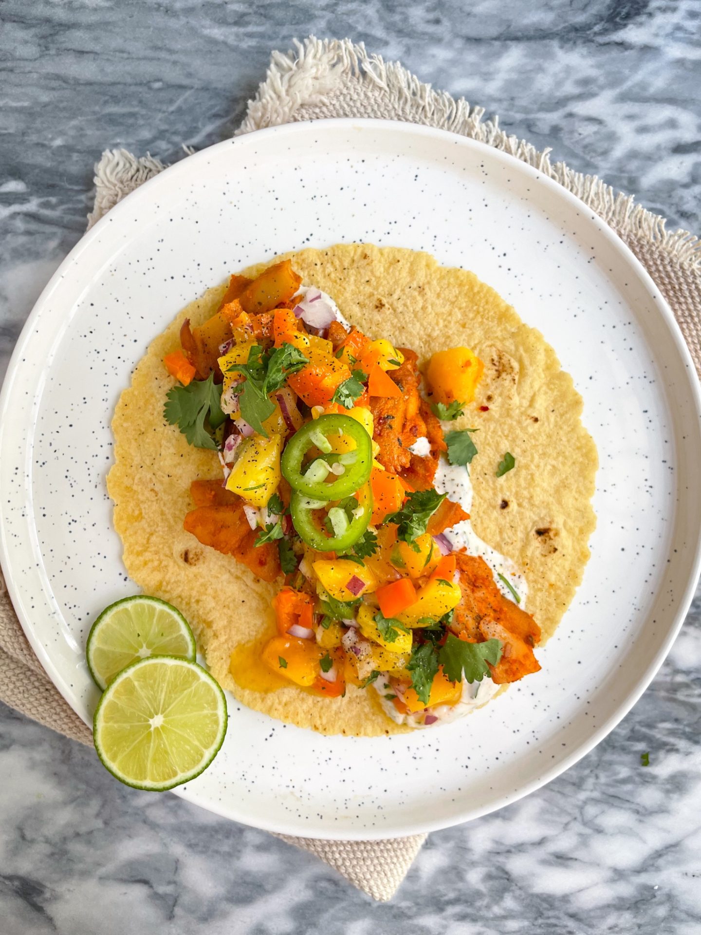 Weeknight Chicken Tacos with Mango Salsa on a white plate