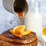 pouring maple syrup on vegan french toast