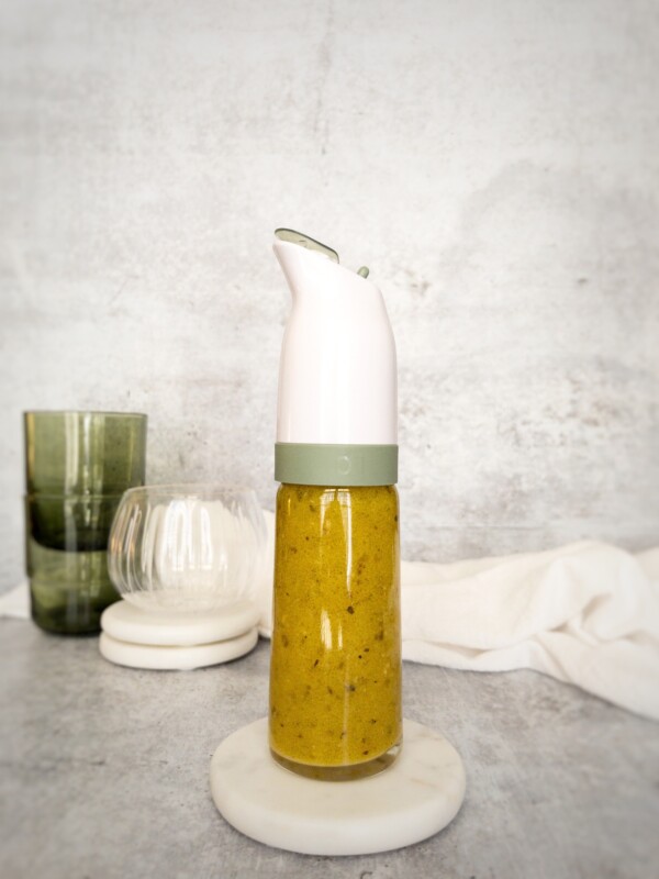 salad dressing in a glass bottle