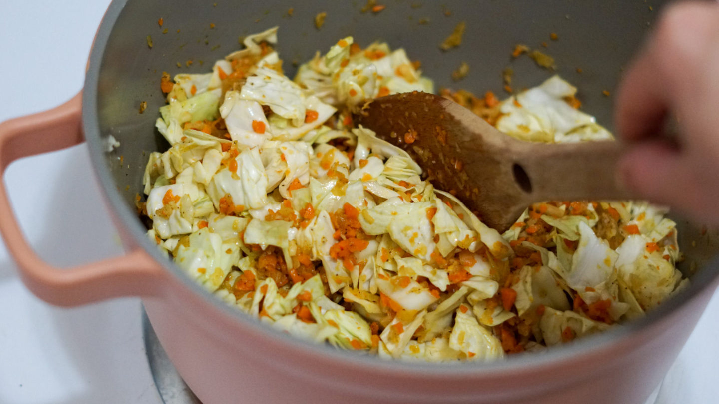 sautéed cabbage and carrots in a dutch oven