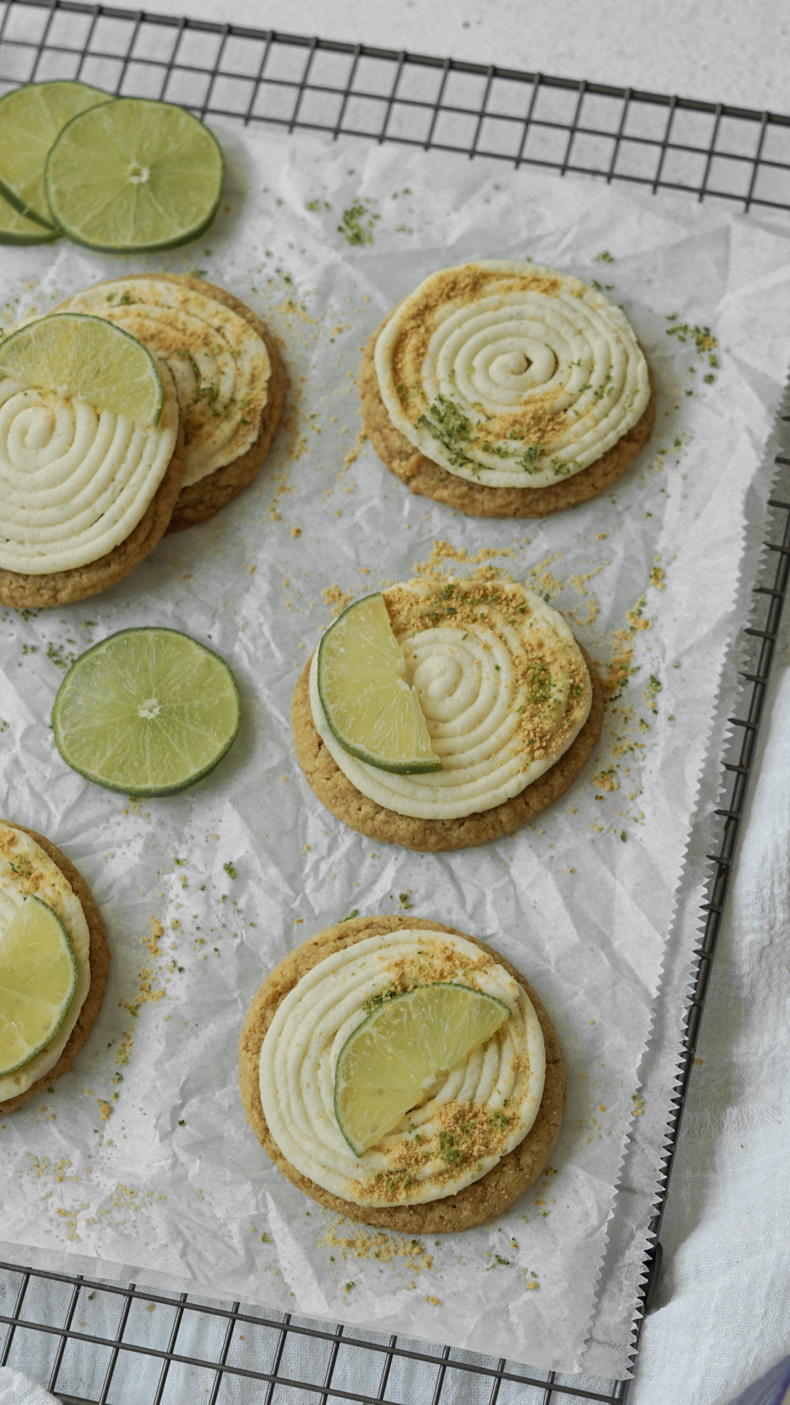 key lime pie cheesecake cookies on a cooling rack