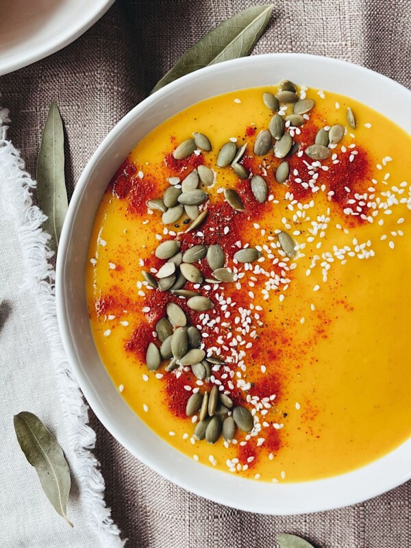 butternut squash soup in a white bowl