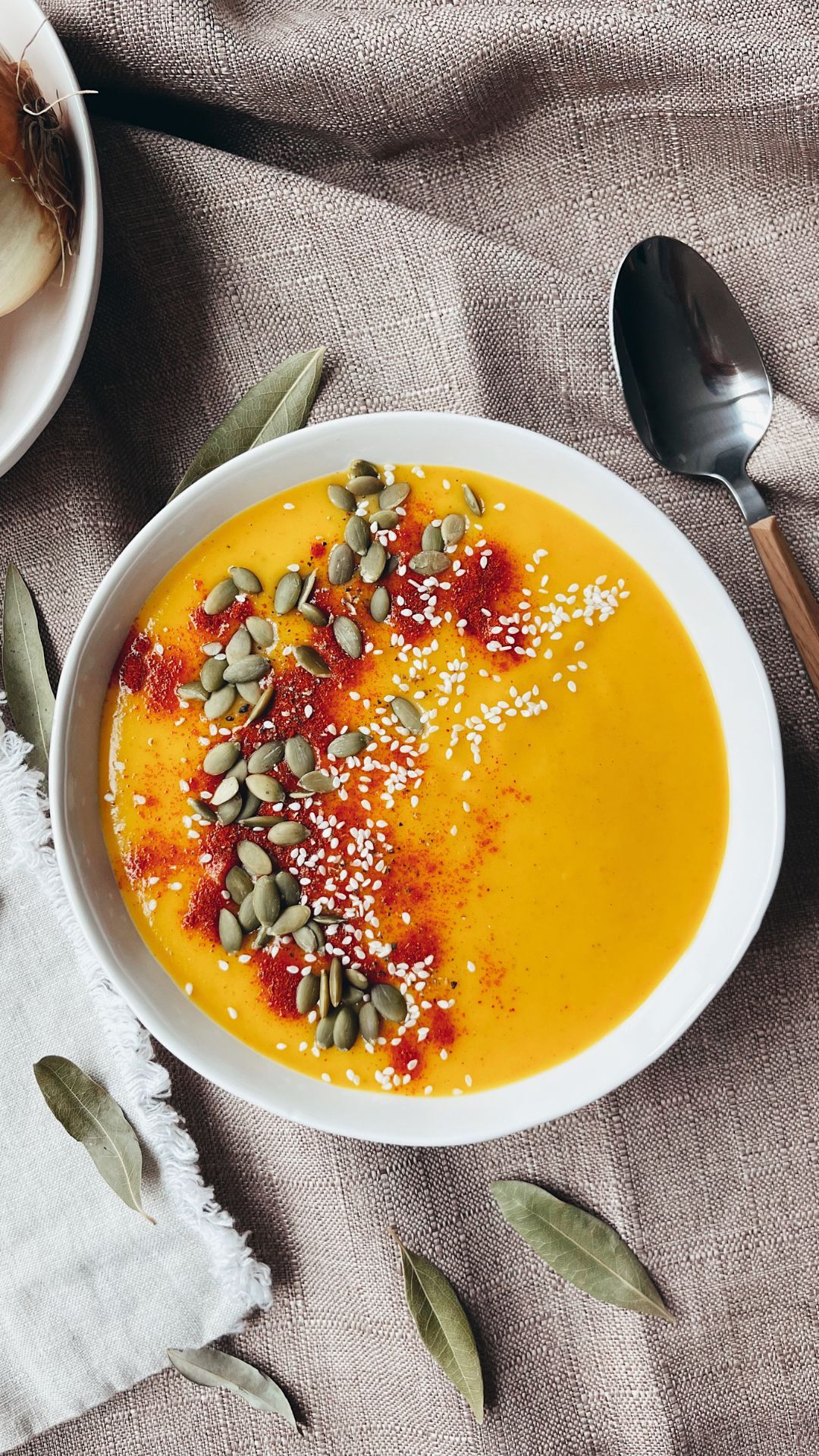 butternut squash soup with pumpkin seeds on top