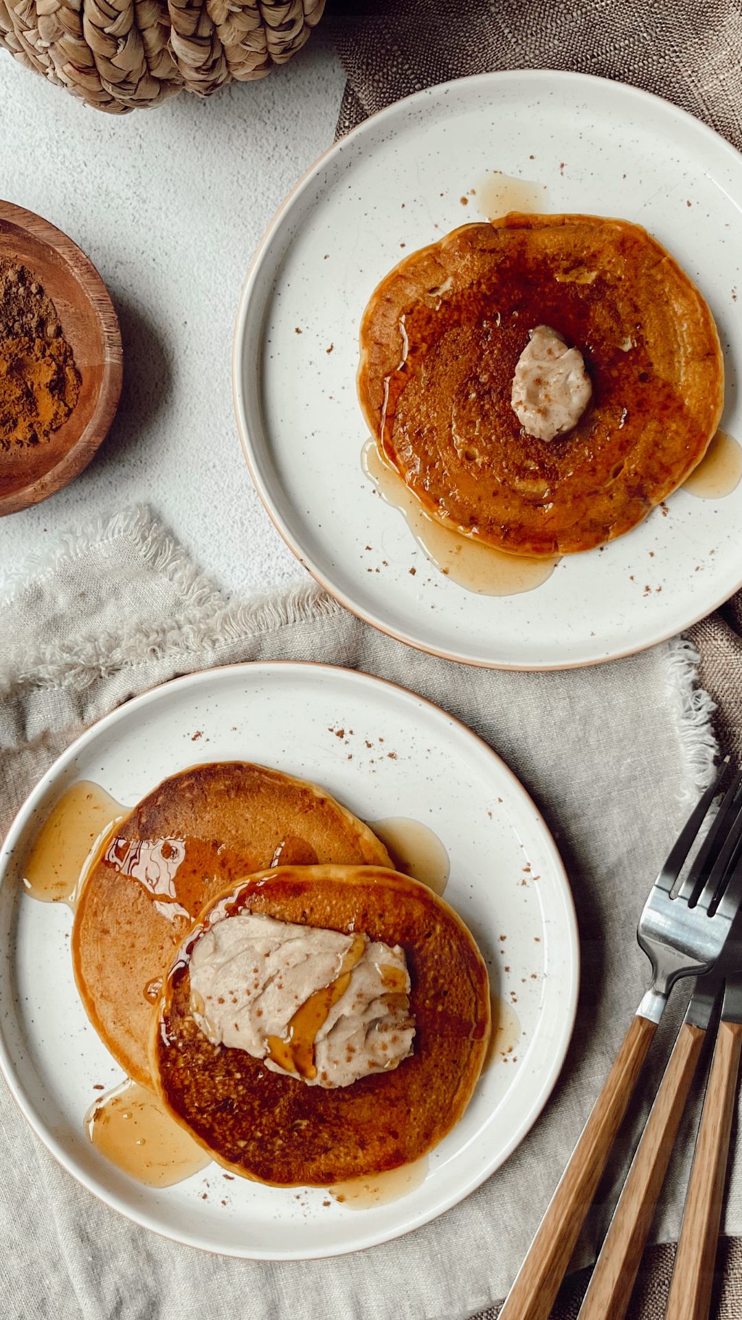 pumpkin pancakes on a white plate