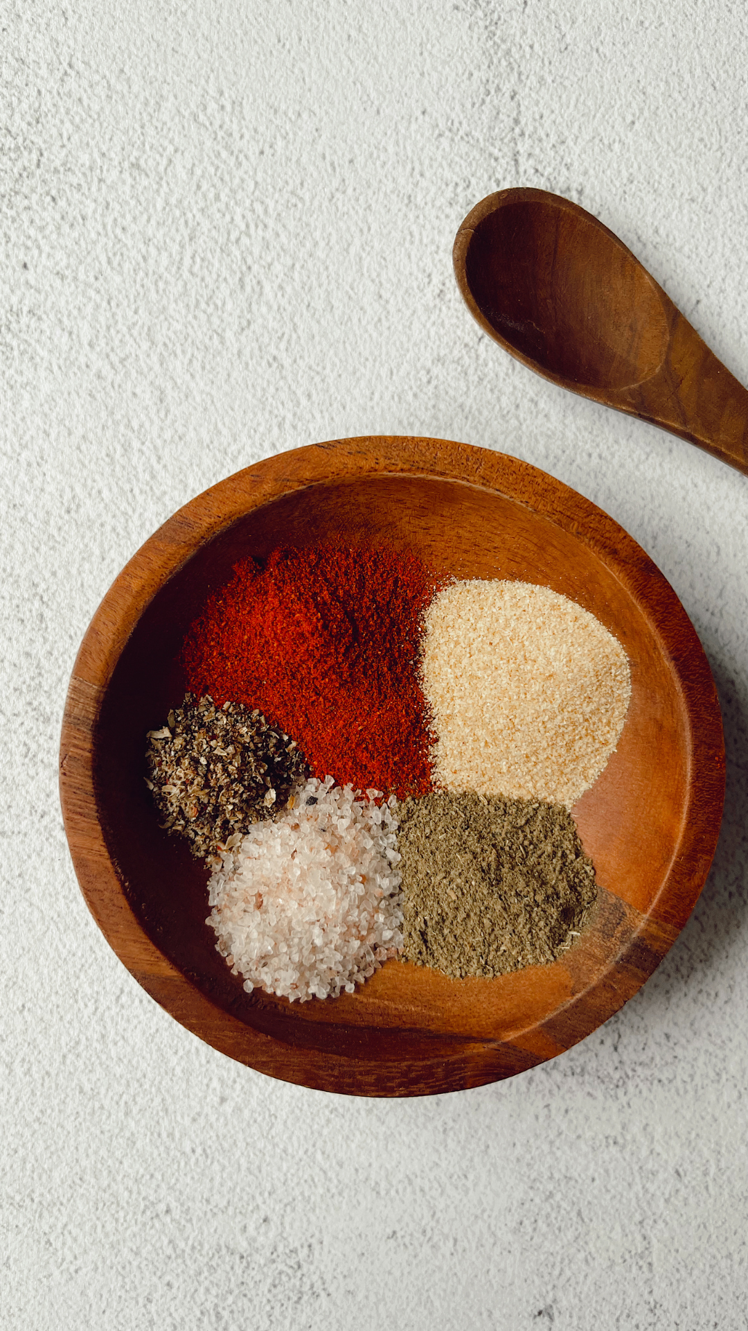 spices in a wood bowl