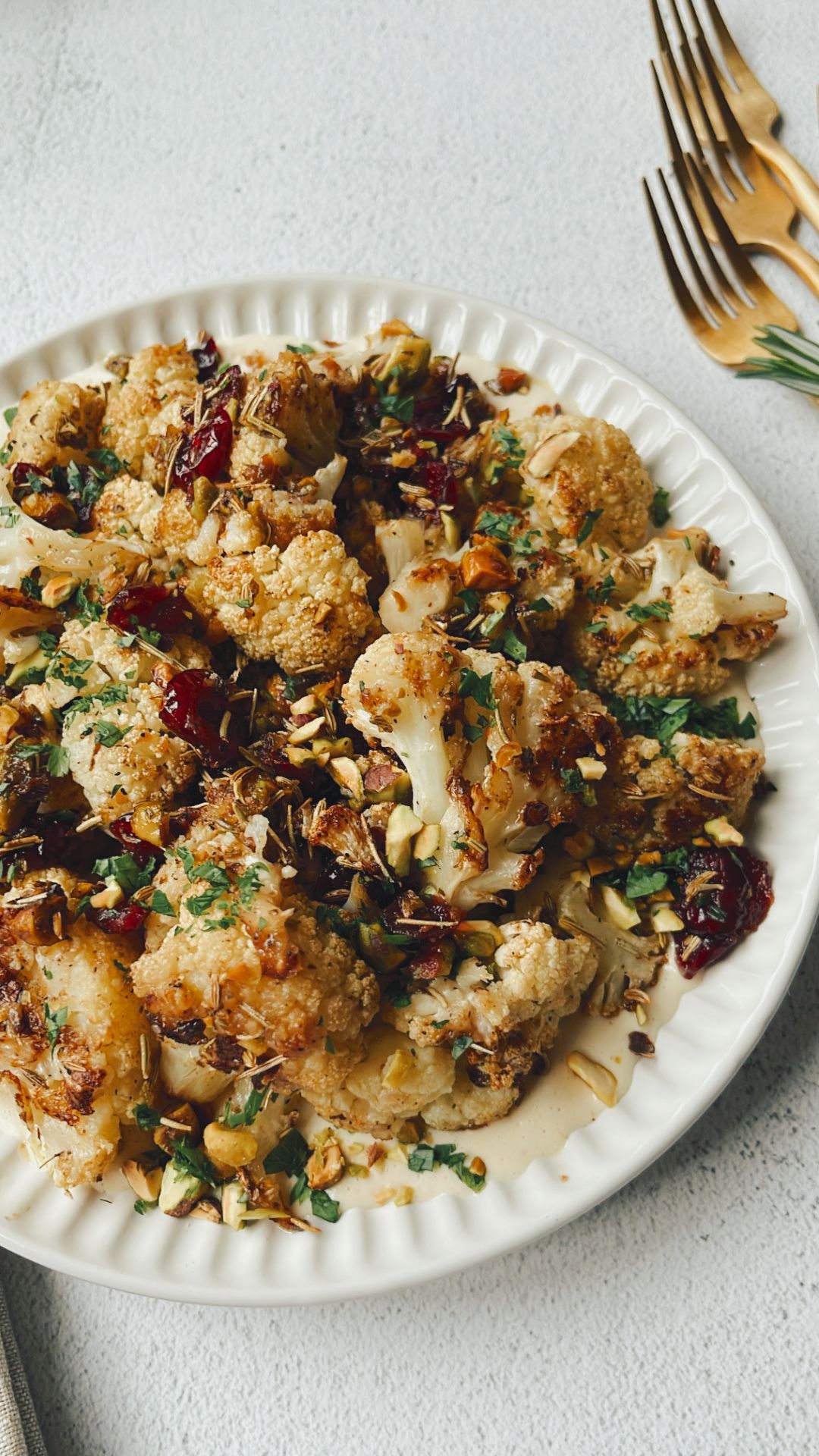 Roasted cauliflower with rosemary, pistachios and cranberries