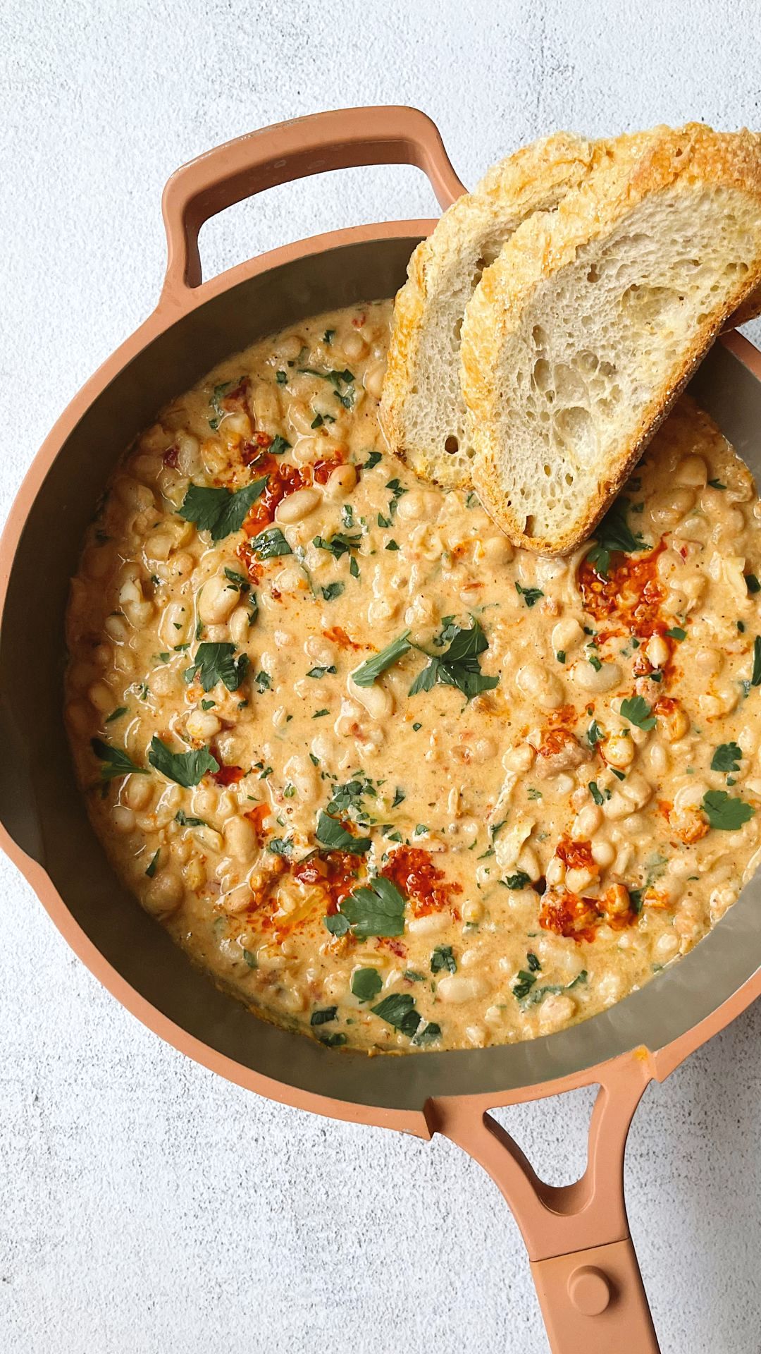 cooked white beans in a pan